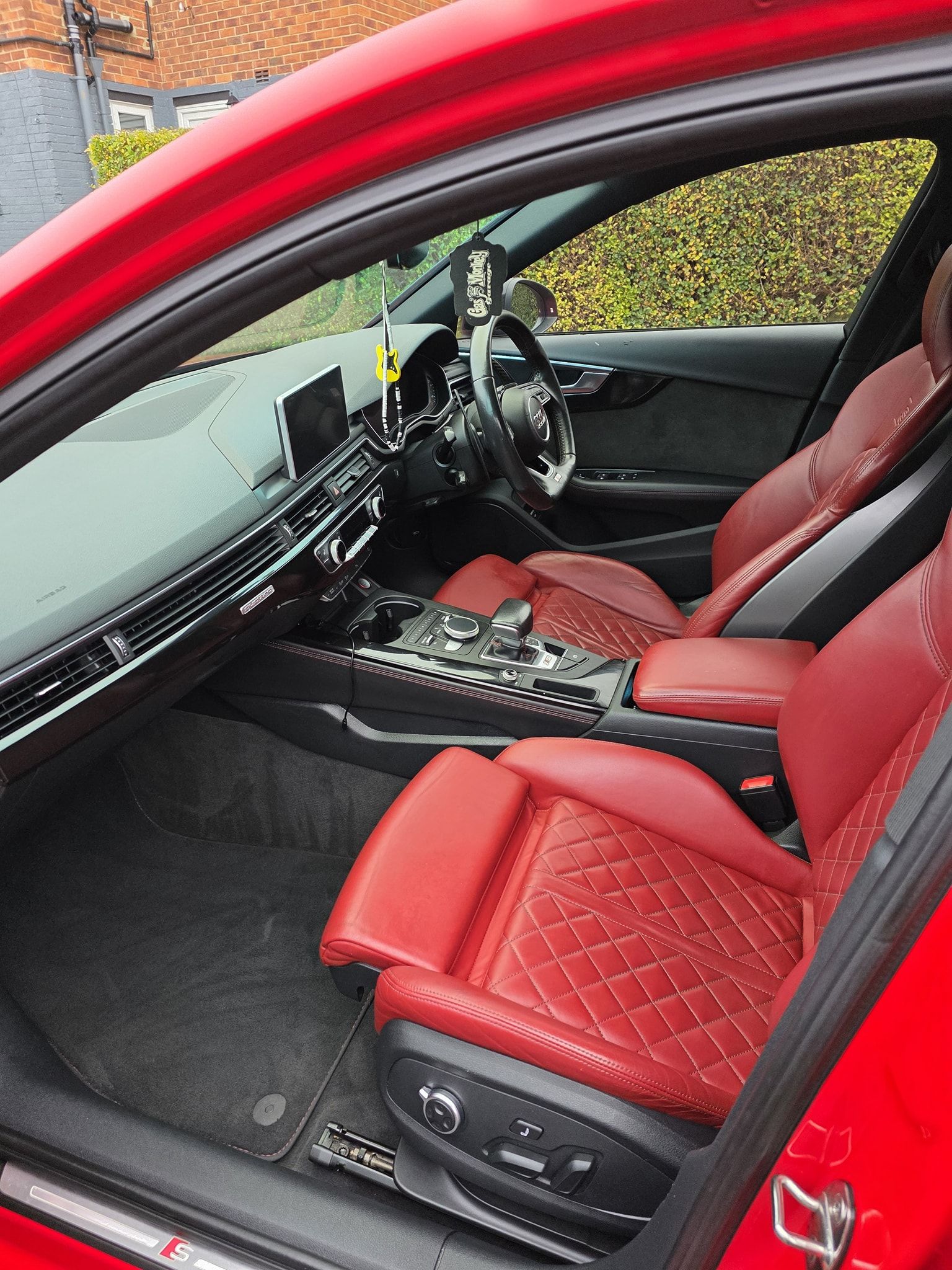 Audi RS3 red leather interior detailed