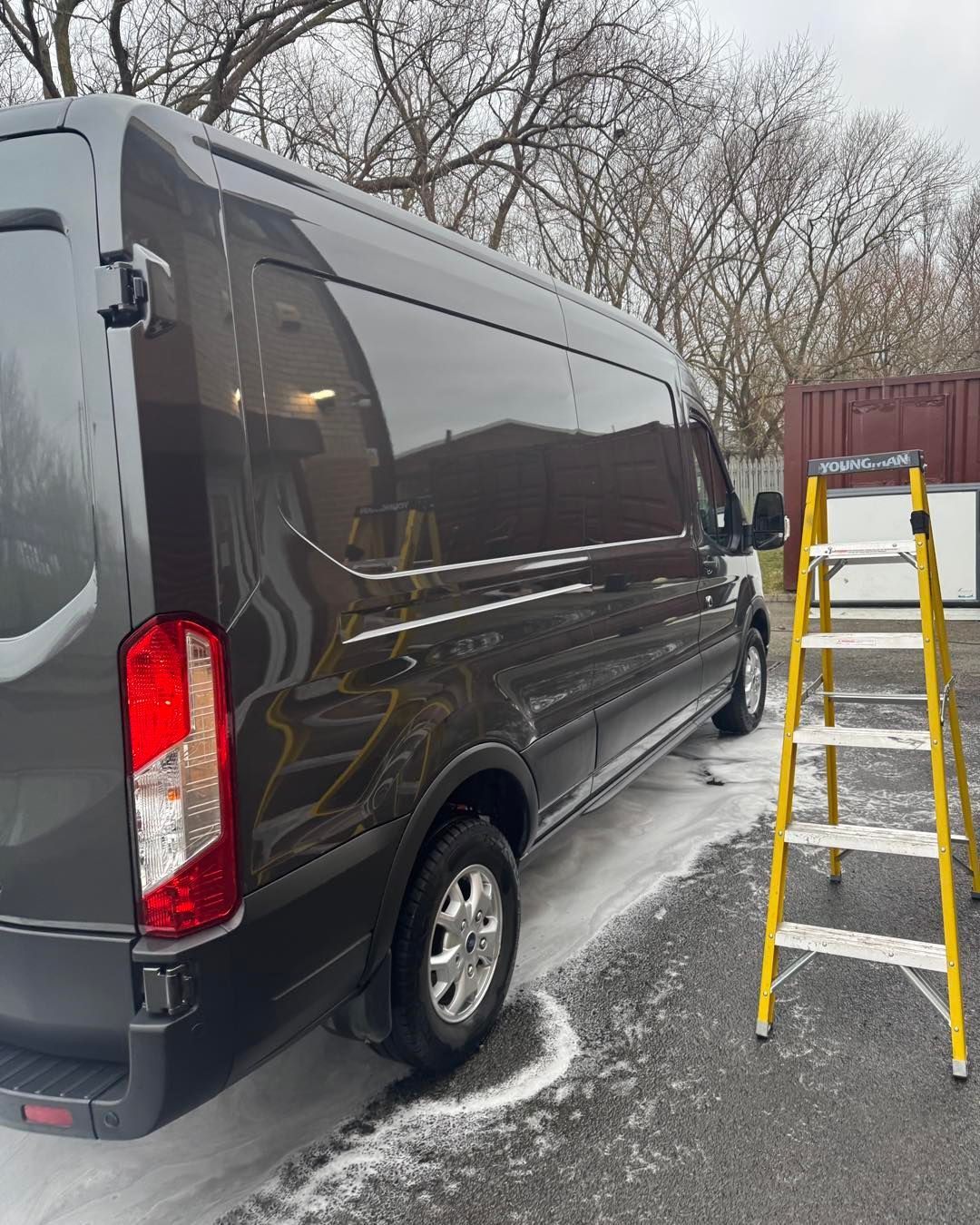 Ford Transit LWB cleaned at depot with step ladder access
